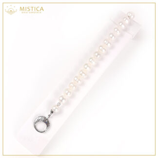 Bracciale di perle naturali con chiusura gioiello in argento 925% . Lunghezza massima 21cm.