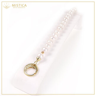 Bracciale di perle naturali con chiusura gioiello in argento 925% bagno oro . Lunghezza massima 21cm.