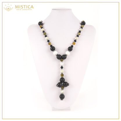 Collana lavorazione a rosario con sfere sfaccettate di ambra, pietra lavica, onice e decorazione in argento 800; Lunghezza massima 70cm regolabile.